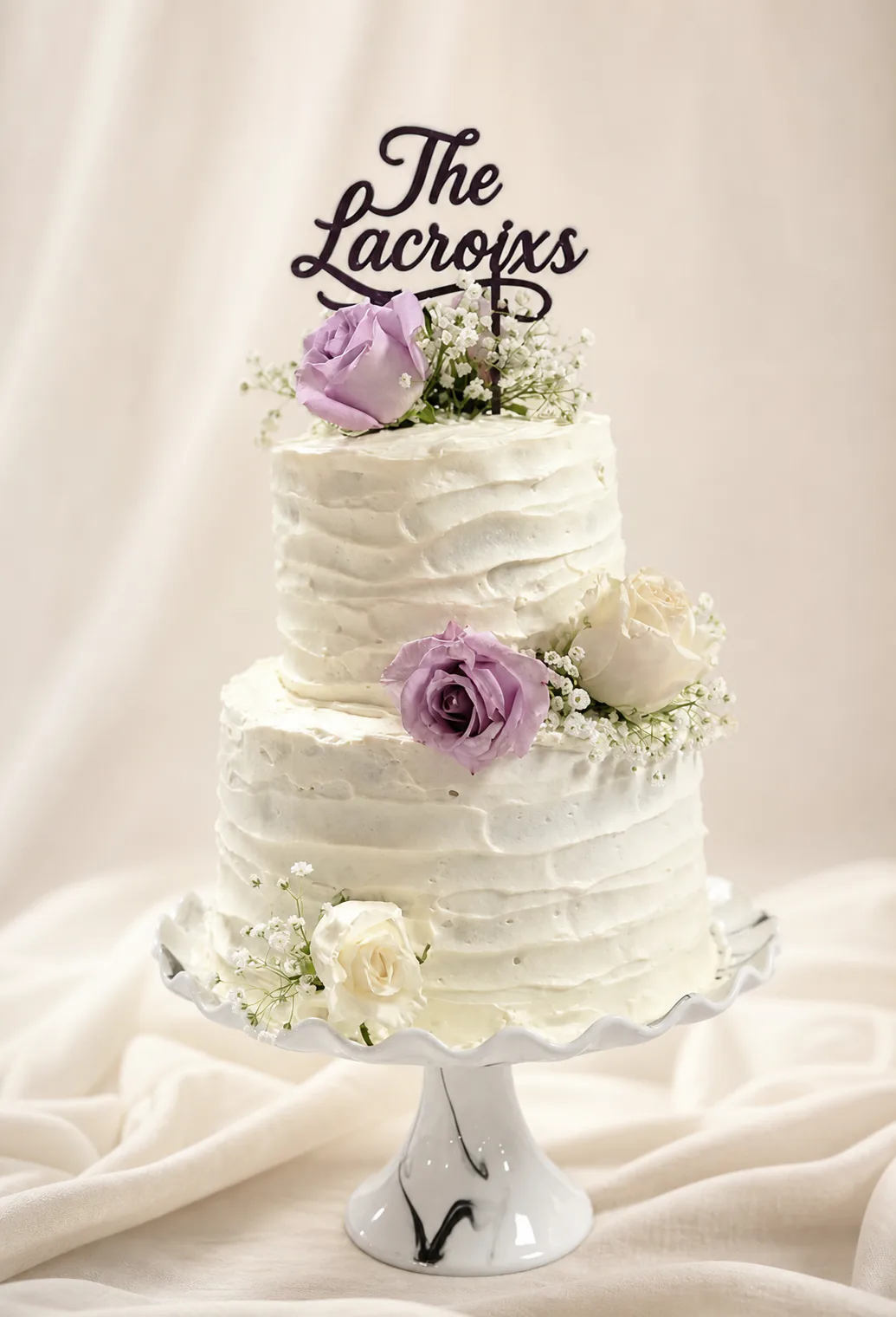 The Lacroixs black wedding cake topper